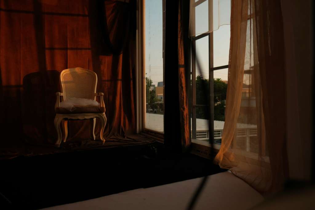 The Black Swan set — vintage chair by the window