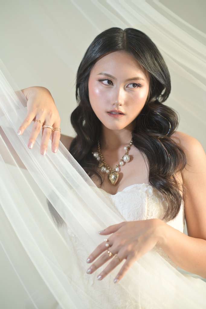 The White Swan set — close up with pearl necklace